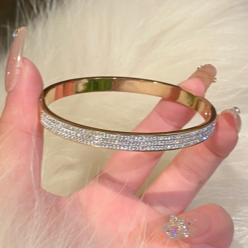 Three rows of diamonds in rose gold
