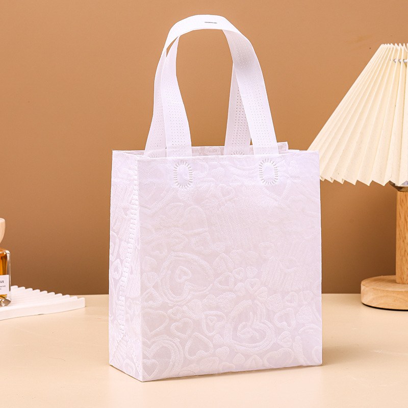 Small white heart - White small heart; 20*18*8; patterned non-woven fabric